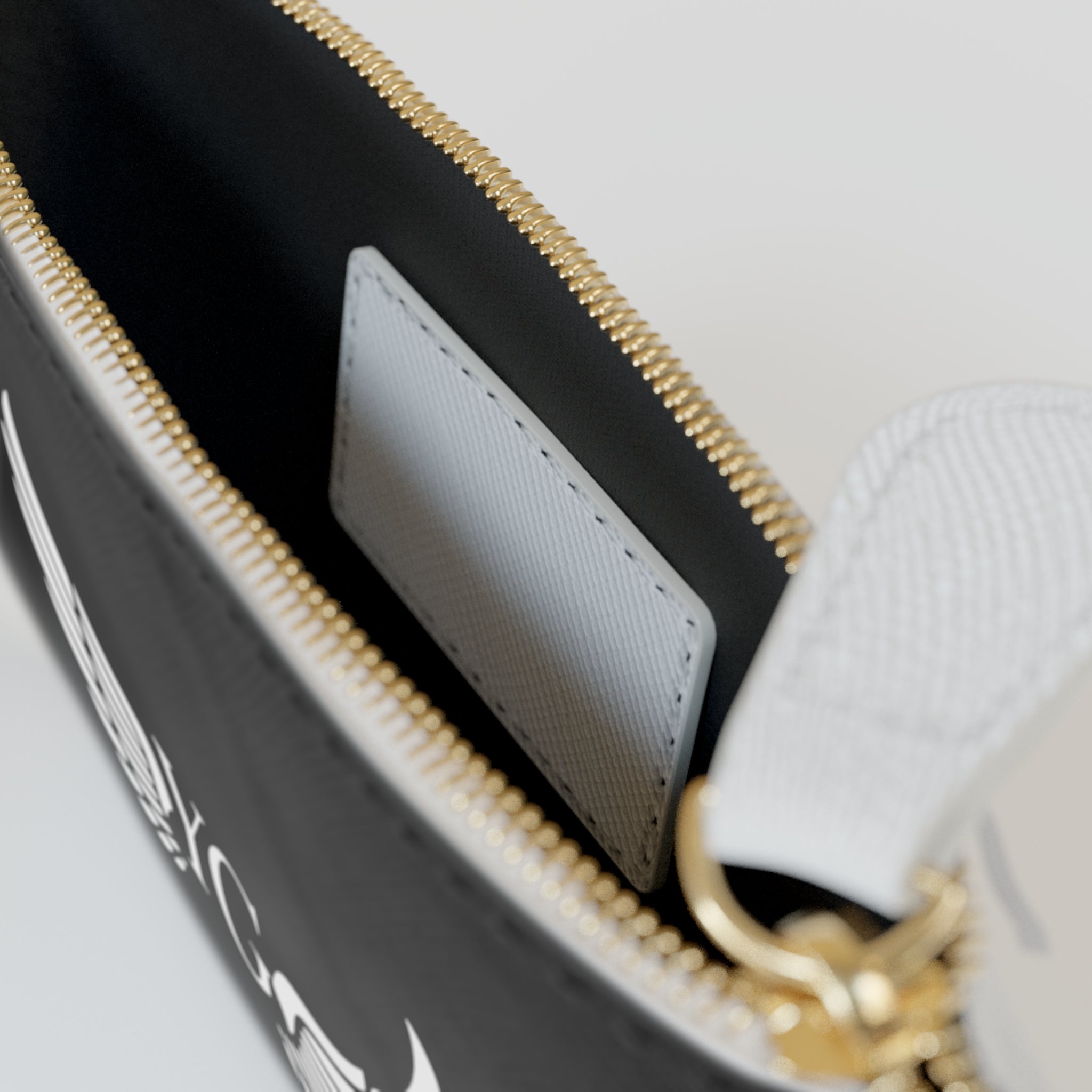 Mini Clutch Bag — Black Winged Monogram (YG) Zipper Pouch